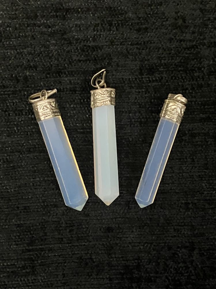 Crystal point pendants