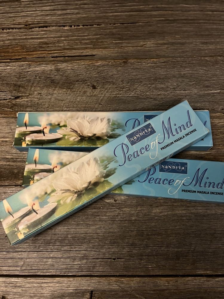 peace of mind incense on wood rustic display