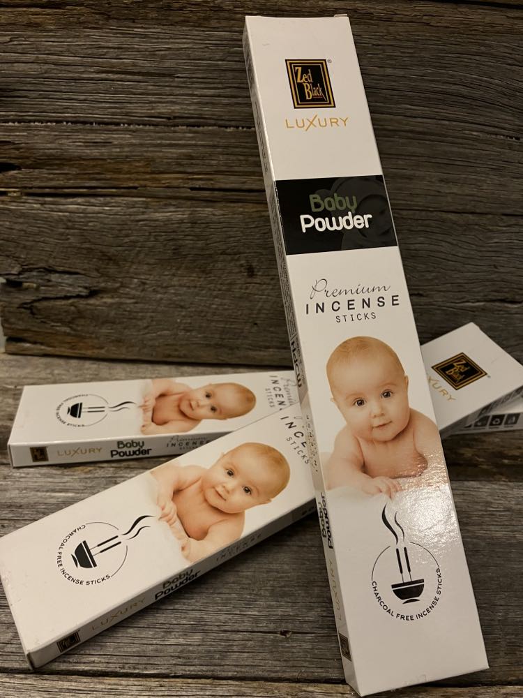 baby powder incense stick on wood rustic displau