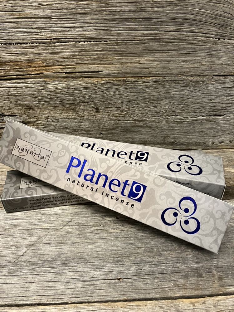 planet 9 incense on wood rustic display