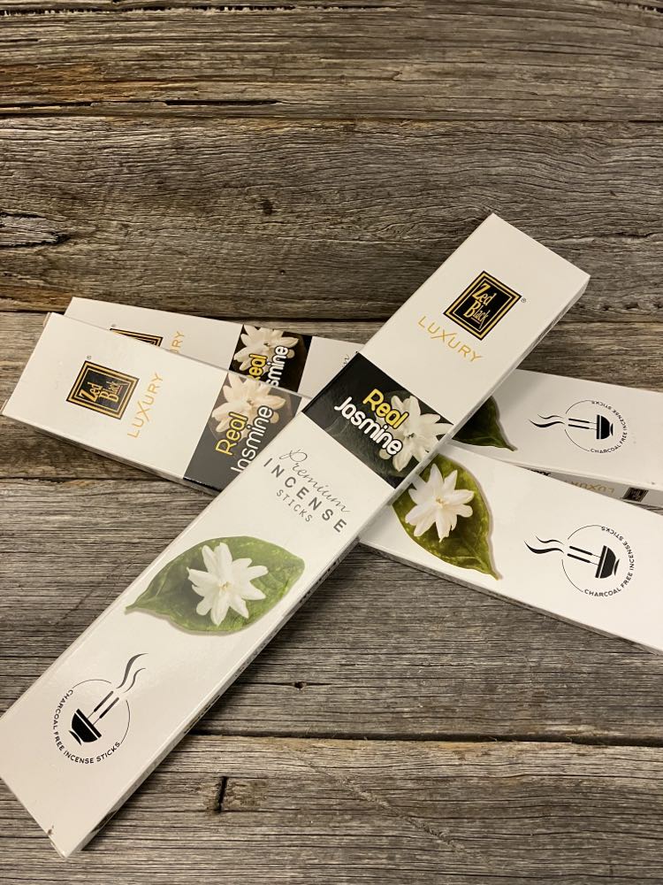 jasmin incense stick on wood rustic display