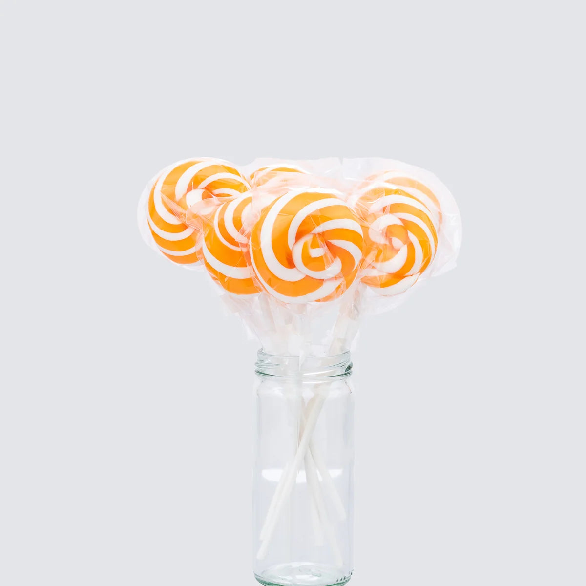 Orange Swirl Lollipops